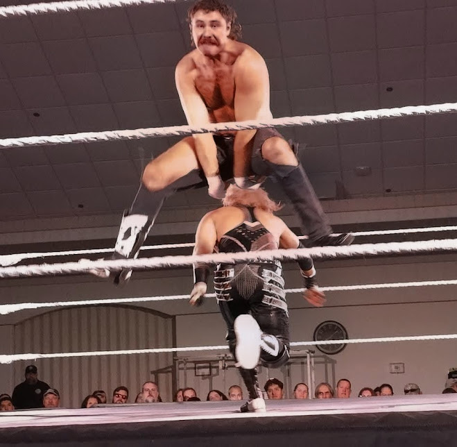 CarlosStoneking's tweet photo. Well here we are I can't think of an NXT Superstar that I love to heckle more that @BrooksJensenWWE... who simultaneously I have a ton of respect for. Never puts on a bad match. #NXTDavenport #WWE #WWENXT #MeasuringStick #BaDMan #BamBam https://t.co/zASm4Xj3dT