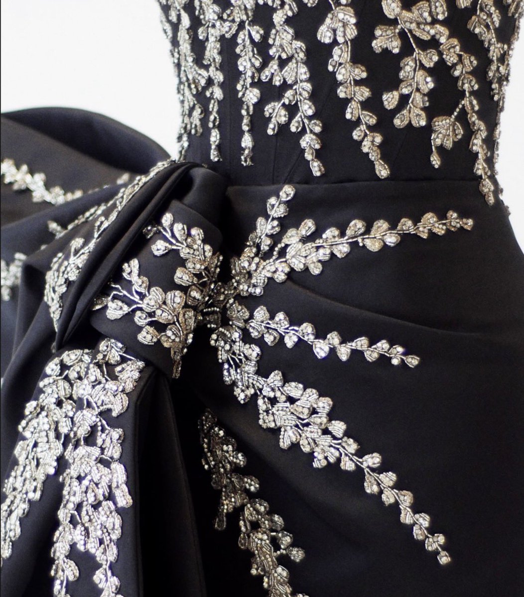 arianapetal_'s tweet photo. A close up of the custom Duchesse satin corset draped bow dress, with silver wisteria embroidery for Ariana Grande on the opening night of "The Eternal Sunshine" Tour. https://t.co/tYCb3UQVMs