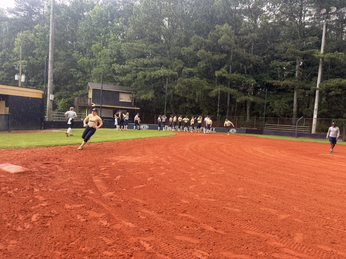 dacula_softball's tweet photo. How our 1st practice started v. How it ended.  We may be wet, but we are working.  #WHYweRISE https://t.co/ZkLj5E9hYy