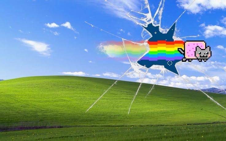 Nyanusdc's tweet photo. Yo @Microsoft there’s something wrong with my desktop 

This poptart cat came crashing out of nowhere https://t.co/V27MN9JGPu