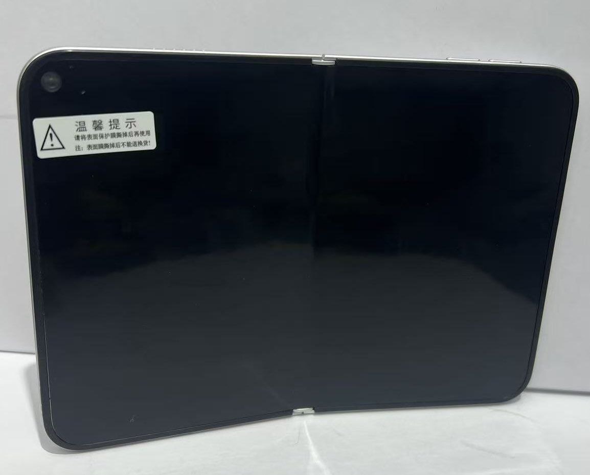 AutonomicsWeb's tweet photo. 🚨 iPhone Fold Dummy Leaks Online

A leaked #iPhoneFold dummy suggests Apple may offer the device in white only, with the inner display camera placed in the left corner instead of the center.

The foldable iPhone is also rumored to feature Touch ID rather than Face ID. https://t.co/KMHszjXuL1