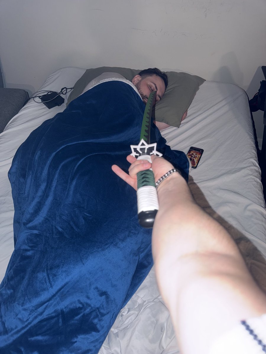 DanPritzel's tweet photo. @doyoulikebeers How I sleep knowing there's a PIMP  watching over me holding his katana a little gay https://t.co/f7U3nVih1s