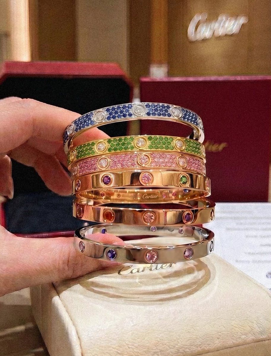 rogue's tweet photo. Cartier really leveled up the iconic Love bracelet by fully paving them in colored gemstones and diamonds https://t.co/Xh7H9UMH74