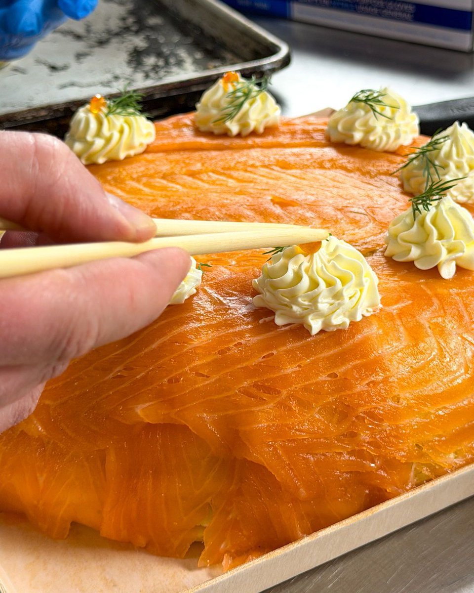 FjordFishMarket's tweet photo. What we've been up to: smoked salmon mousse layered in our crepes, draped with more salmon, topped with lemon frosting and caviar. Stay tuned. https://t.co/nOAotx1GfA