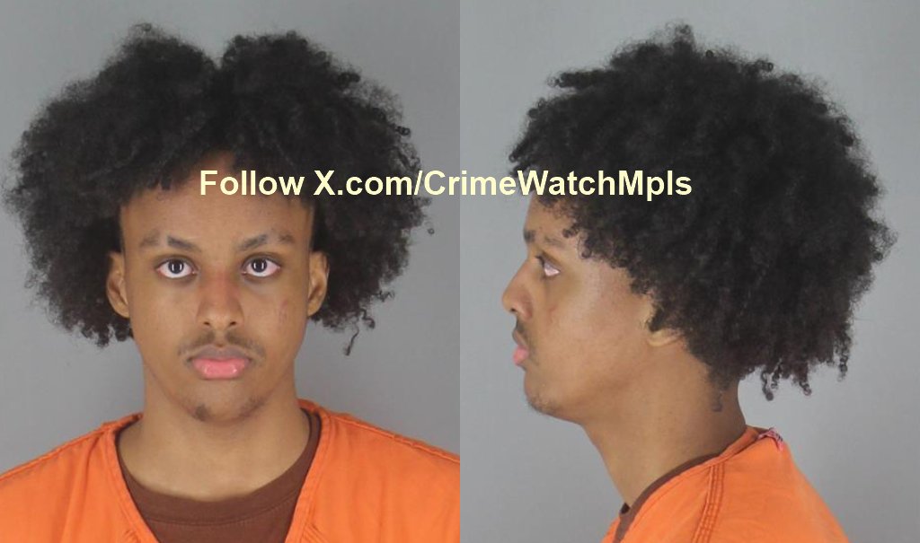 CrimeWatchMpls's tweet photo. Video submitted video on Sunday from the Dayton Kwik Trip.

"Suspect was seen by bystanders and Kwik Trip employees going through employee & customer cars parked off in non-pump parking spots.

Kwik Trip staff called the police and the suspect remained in their vehicle for 10+ mins.

Rogers PD was first to arrive on scene and put the driver at gun point. Hennipen County arrived second to assist with the removal and arrest of the suspect in the vehicle.

Maple Grove PD & Corcoran PD were last to respond. I did not see Dayton PD even though this is basically Dayton, MN at the border.

Police did mention that the Silver Chevy Impala was stolen also.

Suspect was a young male, wearing traditional Somali dress robes."
**
Mukrab Ilyas Ismail, 05.08.2007-age 19, is in custody and is charged with felony auto theft.