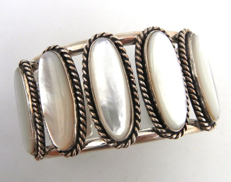 palmstrading's tweet photo. Mother of pearl is said to stimulate intuition, sensitivity, imagination, and adaptability and help with clarity in decision making. 

Cuff bracelet by Navajo silversmiths Leonard Platero, Jr. and Racquel Hurley. https://t.co/PsrF6d1XOI