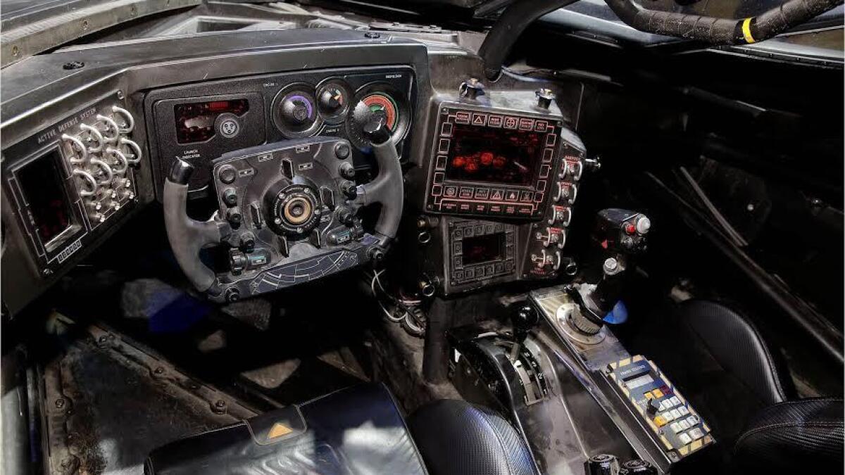 the_whar's tweet photo. @Wozniat The batmobile in Batman v Superman had a sick ass interior console too. Lots of switches to flick and buttons to push. https://t.co/PObs75Tlre
