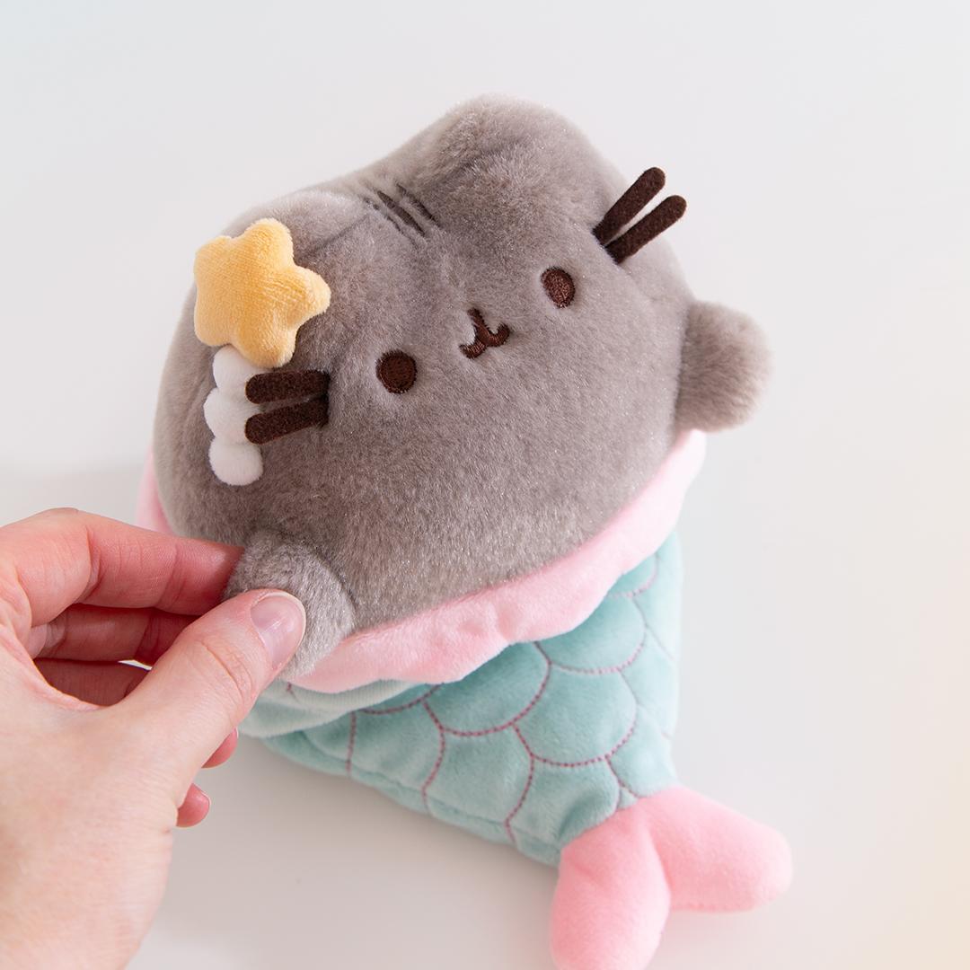 Pusheen's tweet photo. New Pusheen Label Drop! 🐚 Shop the exclusive mermaid Pusheen plush at @ThePusheenShop! https://t.co/8O6Zo2t2nu https://t.co/oSpsiQIibn