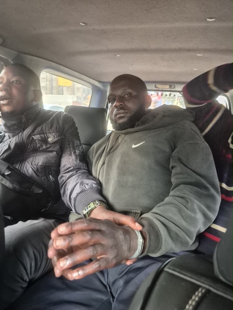 newvisionwire's tweet photo. Police have arrested a key suspect believed to have played a central role in the fatal mob assault on rugby player Sydney Gongodyo, bringing the total number of suspects in custody to nine.  #VisionUpdates https://t.co/X4rXLn4UfP