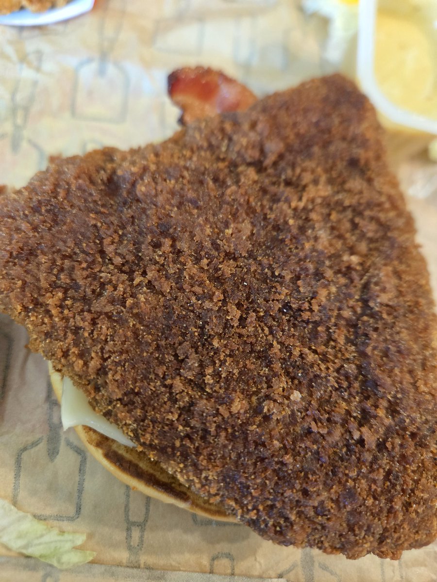 OneBadNinjaGirl's tweet photo. I love love love me a @Wendys asagio chicken sandwich, but can someone tell me what in the burned into oblivion hockey puck hell this is? I am in fear for my teeth... picture of actual sandwich for comparison... https://t.co/bbllI5WLSa