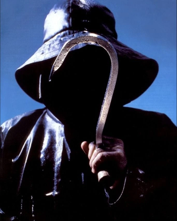 BattleMinePro's tweet photo. @DeadbyDaylight I am pretty sure its the fisherman from "I know what you did last summer". Due to the 7/4 in the branches at 11s (movie takes place on 4th of july in southport NC), the hook being on screen for a good portion indicating the fishermans hook on his hand as the weapon. https://t.co/83fav6pn8K