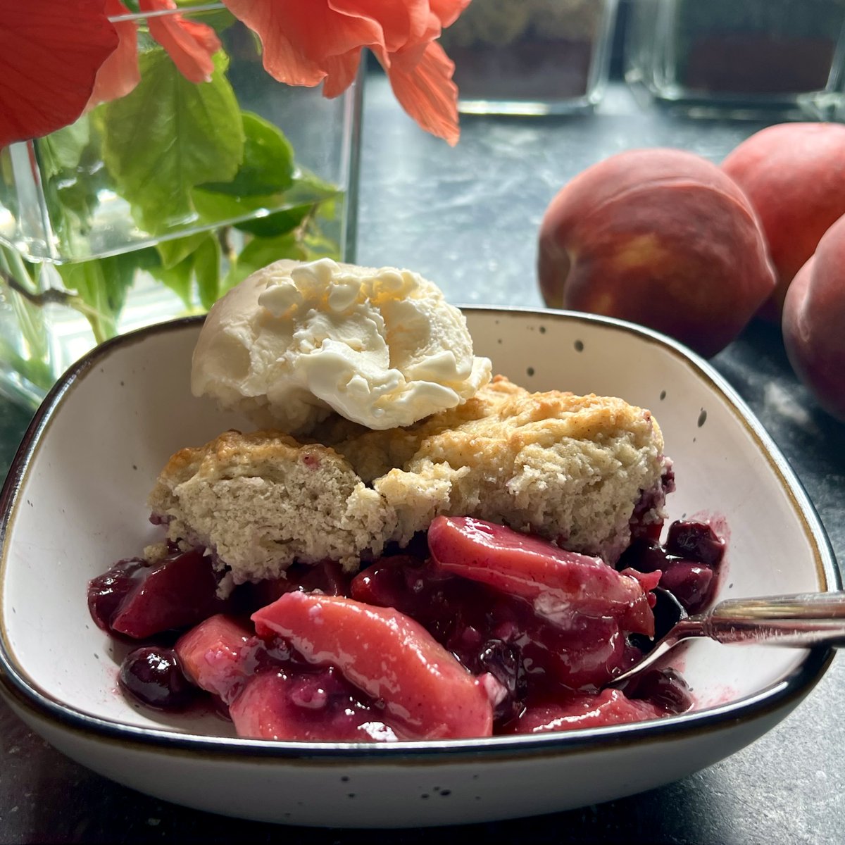 MagicalKitch's tweet photo. Serve yourself bowl full of summer. 

Peach Berry Cobbler 🍑🫐

Cook down peaches and berries for 20 minutes. Mix up a 5-minute biscuit batter. Pour into baking dish. Plop batter on top and bake 20 minutes.✨

📓 Full Recipe on the way. ❤️

#KitchenSpells #SummerPeaches https://t.co/SFfyrRNgdk