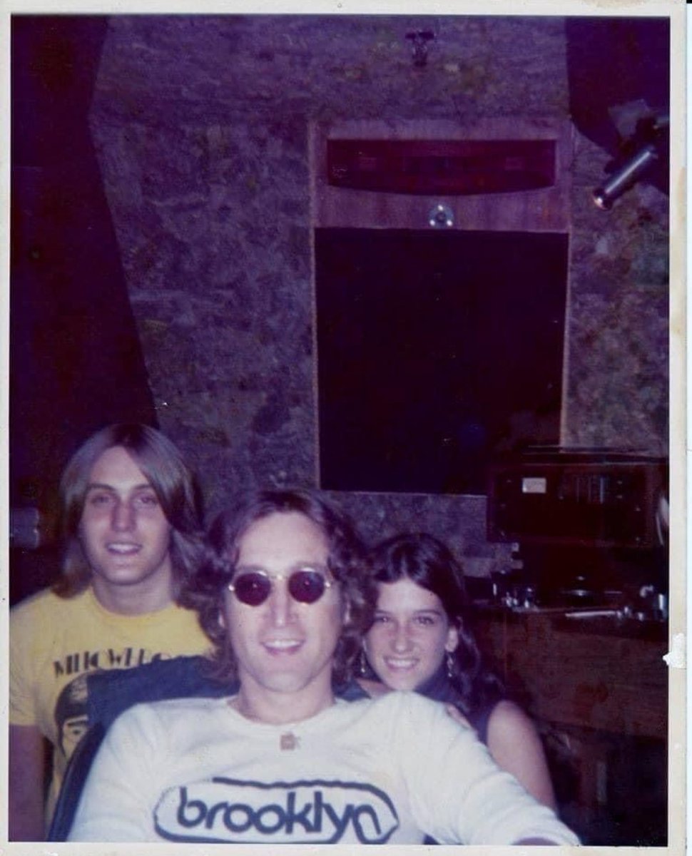 ceofjohnlennon's tweet photo. Polaroid of John Lennon with the fans Geoff and Pam photographed by Nicky Hopkins at the Record Plant Studio, July 5, 1974. The fans were allowed to stay some days with John during the Walls And Bridges sessions.

© Geoff Lip Danielik/Via: Meet The Beatles For Real. https://t.co/SYYjdUxmVm