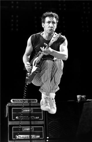 crockpics's tweet photo. Pete Townshend getting some serious air at Shea Stadium on October 13, 1982. Ebet Roberts caught this moment during the second night of The Who's big two-night stand in New York. The band was calling this their First Farewell Tour, right after putting out the It's Hard album. Back then, people really thought this was the end of the road for them, which gave these huge stadium gigs a lot of weight. Were any of you out in the crowd at Shea Stadium for these back in '82? What stands out the most when you look back at those nights? Drop your memories in the comments! 👇