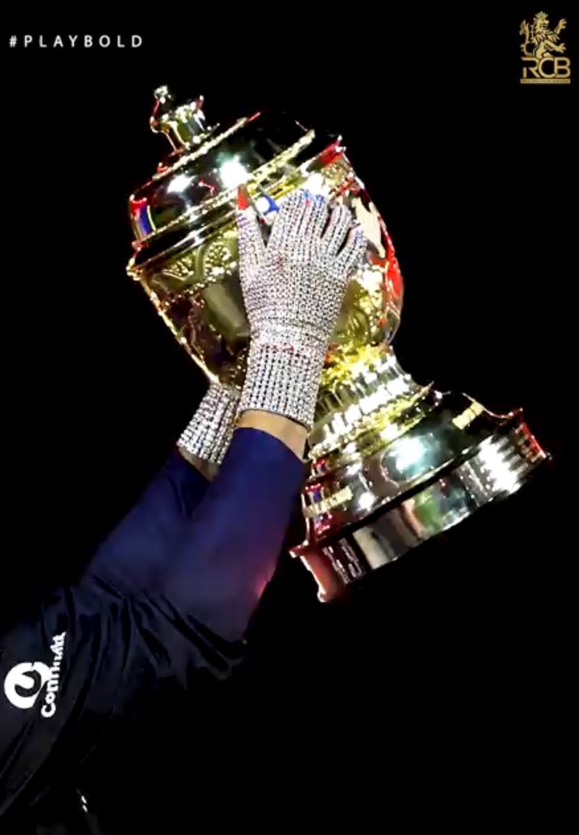 BluntIndianGal's tweet photo. The Iceman gloves with the IPL trophy in his hands. Nothing just RCB perfectly describing Rajat Patidar’s aura. 🥶 https://t.co/cj1tFNPFAk