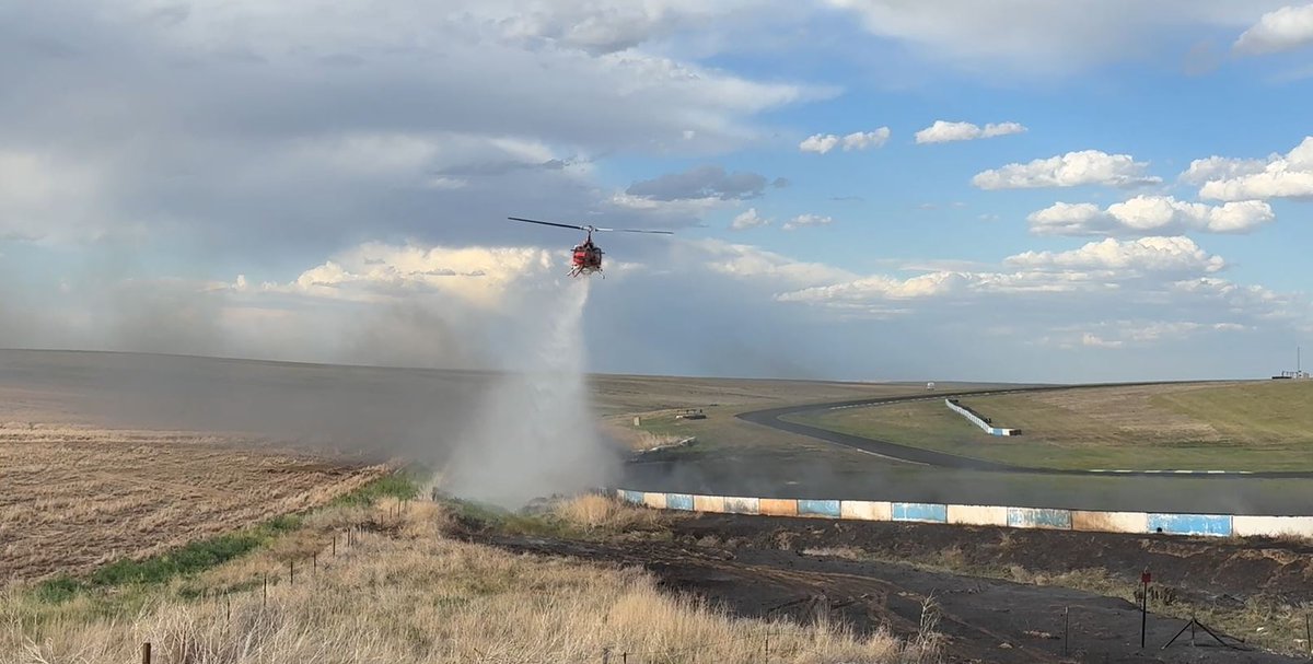 ArapahoeSO's tweet photo. Arapahoe sheriff deputies are still on the scene of a tire fire that began as a grass fire around 3:30 p.m. today near High Plains Raceway, northeast of Deer Trail along U.S. Highway 36.

The grass fire jumped a concrete barrier and ignited a stack of tires at the raceway. Five deputies responded to assist as multiple fire departments and a helicopter worked to contain the blaze.

Approximately 20 acres burned. The grass fire has been extinguished, but the tire pile continues to smolder.

No injuries or additional property damage have been reported. The cause of the fire remains under investigation.

Responding agencies: @ArapahoeSO, Agate Fire, @BennettFirePIO, @ByersFD, @CSP_News, Deer Trail Fire, @ArapahoeCounty Wildland Fire, @SableAlturaFire, Southwest Washington County Fire, and @StrasburgFire.