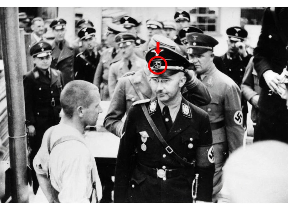 CUNY_Prof's tweet photo. Heinrich Himmler, chief architect of the Nazi concentration camp system, proudly brandished the Totenkopf that @grahamformaine placed on his (now concealed) chest.

Never in my wildest nightmares did I think that someone with that symbol could ever be so close to power again. https://t.co/EWJlImNy3W