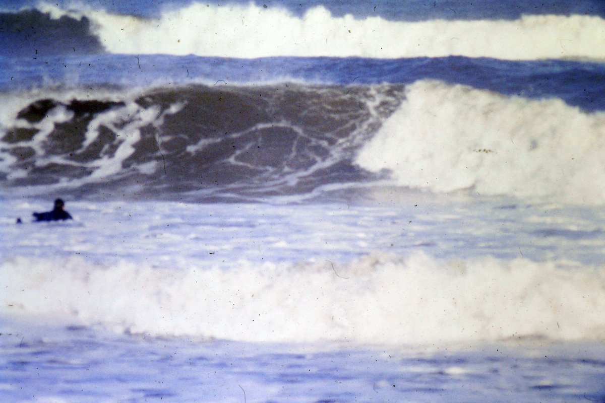 outdoorscots's tweet photo. Old slide film pics of a solid swell hitting St Andrews back in 1999. (That's my little bro in the wetsuit with the giant Quiksilver logo on the ass..)  

#surfing #scotland #standrews #westsands #eastsands #castlesands #photography #surf #waves #winter #pierwalkcancelled https://t.co/IIiCCK8f50