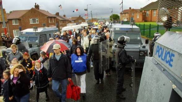 redoctoberirp's tweet photo. Anyone from Ardoyne who stood at the shops alongside those racist, sectarian bigots from Twaddell last night should be named and shamed.

Away and live with your new found friends across the road and see how long it lasts. https://t.co/a9D7vWGgSd
