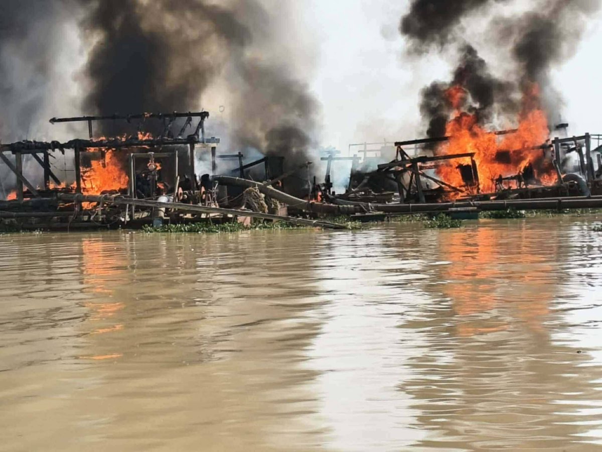IrrawaddyNews's tweet photo. Coup leader Min Aung Hlaing said Tues his govt will suppress illegal gold mining. He framed the move as environmental, but analysts say his aim is to cut off resistance funding. Photo: Resistance gold-mining site in Sagaing bombed by the junta in March / CJ #WhatsHappeningInMyanmar