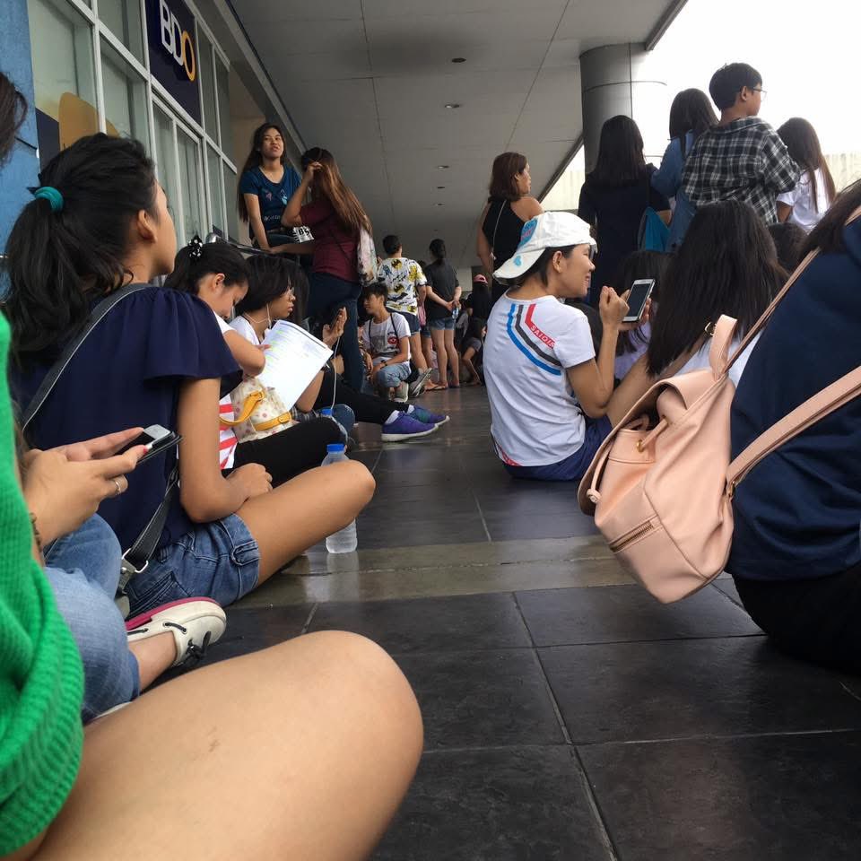 thvsahi's tweet photo. this was us in 2017 during wings tour tix selling. we were camping outside sm at 5am. we only entered inside around 1pm already because many fans cut the line and went first. good thing ticketing now is purely online 🫩 https://t.co/V0IMYwORhw