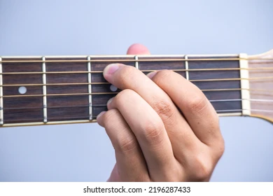 wongirlie's tweet photo. apparently there was another logo candidate, it was a design based on a hand holding down a guitar chord
specifically, the Cadd9 chord because it's one of his favorites

he explained that if you imagine the lines in the logo as guitar strings, the shape would form the fingers pressing down a Cadd9, allowing the logo to capture both the sound of the chord and the personal meaning it has for him...
the amount of thought he put into every little detail is honestly kind of crazy