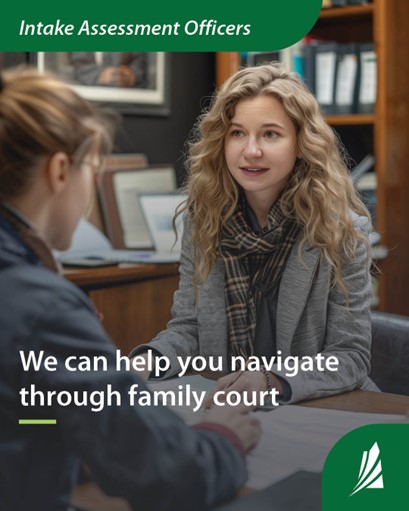 A woman with long, wavy hair sits in a library and assists another person who is across a table. Text overlay reads: Intake Assessment Officers. We can help you navigate through family court.