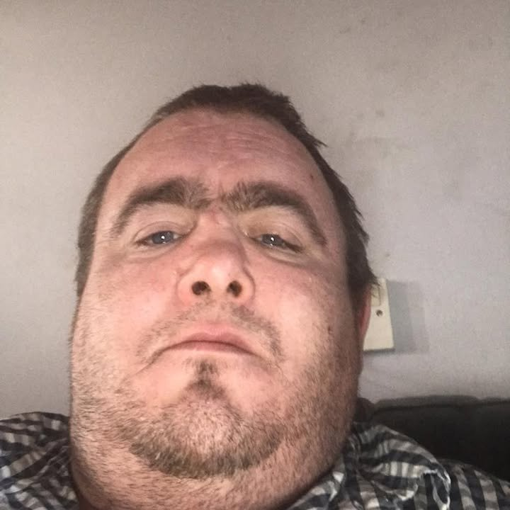 CCrowley100's tweet photo. This is Stephen Ogilvie, the victim of the attempted Belfast beheading.

According to reports, he was extremely hard of hearing, had learning difficulties, and, in a bitter irony, had helped the man who attacked him move into his new home just days before the attack.

That is the part people should not skip over.

We are endlessly told the system exists to protect the “vulnerable.” We are told there is a “humanitarian obligation” to take strangers in.

But when our own people are left bleeding in the street, who is being protected?

Certainly not them.

A system is what it does, and this system hates its own people.

It imports violent strangers from incompatible cultures, forces ordinary people to suffer the consequences while the elites who imposed this absurdity remain safely insulated, and then lectures the dispossessed that their own erasure is a moral duty.