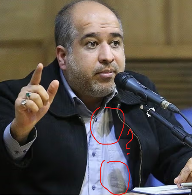 donicc's tweet photo. Iranian lawmaker Ali Khazarian claims US has lost 16 regional bases to Iranian missiles.😆

Personally I would go to extreme lengths before I'd wear a shirt with not one but two giant coffee spills. Maybe he spilled in the bomb shelter. https://t.co/38htiLC50U
