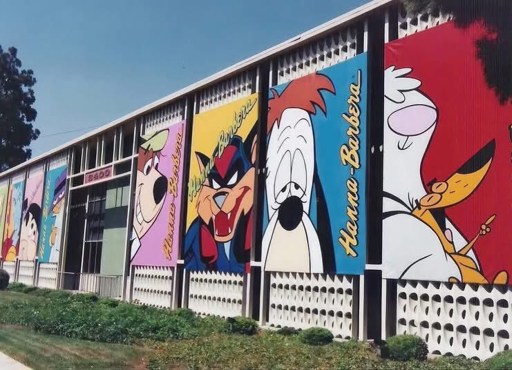 ScoobyandCam's tweet photo. 🎞️✨ A blast from the past! These amazing photos show the iconic Hanna-Barbera Studios building in the 1990s, covered with giant banners featuring some of the studio’s most beloved cartoon stars. From Yogi Bear and Huckleberry Hound to Hong Kong Phooey, Dick Dastardly, Space Ghost, and more, this place was a dream destination for animation fans.

For many, just driving by and seeing these larger-than-life characters was a magical experience and a reminder of the incredible legacy Hanna-Barbera left on television history. 📺💛

❓Did you ever get to visit the Hanna-Barbera building or see these banners in person? Share your memories, photos, or favorite Hanna-Barbera cartoon in the comments! 👇🐻🚀🐶
