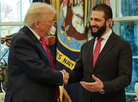 StevenW18178656's tweet photo. @ESPNUK Meanwhile here we see, some ex al-qaeda group leader shaking hand with orange man. Double standard much about definition of T words?!? https://t.co/0rdGkPe2DJ