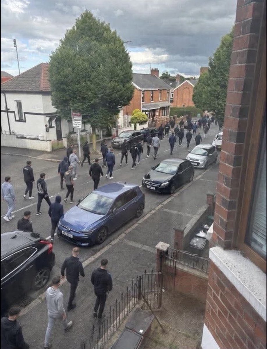 PurpleStandard's tweet photo. @News_Letter “Loyalists” walking down the Cliftonville Road 🙄🙄🙄 https://t.co/LaBKtszZ6Z