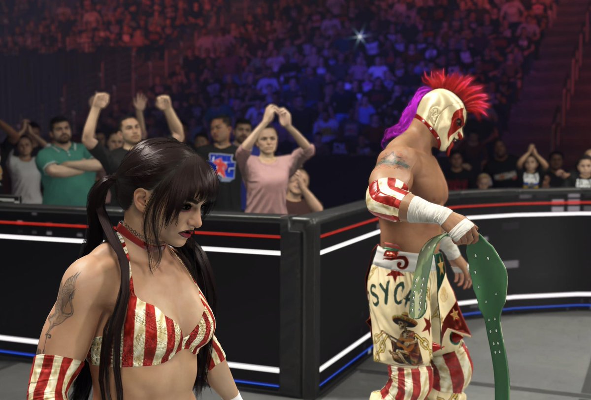 LaurseyXO's tweet photo. Looks like the Mixed Tag titles weren’t missing.. they were STOLEN! 

Tatum Paxley &amp; Psycho Clown just ambushed the champions from behind and made it very clear that they are coming after the titles. #WWE2K26 #UniverseMode #MixedTag https://t.co/df0YQWfum5