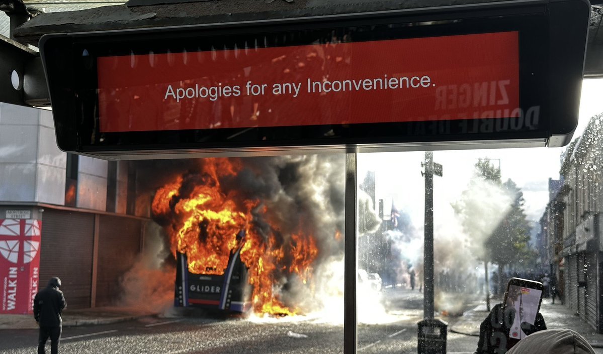AllForProgress_'s tweet photo. There are two things worth remembering about Belfast, when you're looking at pictures like these.

The one thing is that Belfast is not like the rest of Britain. And the other thing is that it is exactly like the rest of Britain.

In the first case, the mainland has been spared, within living memory, the sight of its own streets given over to political violence. An Englishman of seventy has known peace his whole life. An Ulsterman has not. In the most recent chapters of its story it has worn a different face altogether - the armoured vehicle on the corner, the masked man, the burning thing dragged across the road - and that face is not so far back in the city's memory as to have been forgotten. A place that has done this before knows the shape of it when it returns.

On Monday night a man in his forties was set upon in the north of the city by an assailant who stabbed him about the head and then, in the open street, attempted to cut his head from his body; he is alive only because passers-by took it upon themselves to drag the attacker off him. A Sudanese man in his thirties was charged with attempted murder. By the following night the city was alight, and the old furniture of disorder - the masked crowds, the burning vehicles, the police behind their armour - stood once more on the streets of Belfast.

What has changed, both from what we saw back then and from what we have seen in other recent protests against violence meted out against Britain by visitors, is the character of the fury. That a wronged public should rise is as old as these cities themselves; the temper in which it rose this week is what is new. It was colder than the protest of a year or two ago, more disciplined, more conscious of itself. The faces were covered, near enough every one. Phones of documenting onlookers were, it seems, checked for any photos of faces they may contain. The crowds came and went to a purpose. To an observer at a distance it at least half had the look of a body that had decided something in advance and come to carry it out.

That impression - of an action planned and complete, of an organised thing moving against the authorities - is the part that ought to occupy serious minds, whatever they make of the rest of it. One does not need to have a drop of sympathy for the notion of mob rule, nor be inclined to excuse a single article of public or private property destroyed, to see that it belongs to a slightly different genus of ordinary grievance.

And so one is left with the question, which is not a comfortable one. 

Is this the return of the thing Belfast knew and the mainland was spared - mob violence as a settled feature of public life? And beneath it, a graver question still: whether the logical end of governments across the Western world pressing upon their peoples, year upon year, an immigration those peoples have plainly and repeatedly refused, is a slow settling into restive, low-grade civil strife - in which men who have concluded that their votes have been made useless turn to force, having found it the one instrument the state can no longer ignore. 

One can only hope it is not so. But there is, in the end, a single sure way to avoid it, and it has nothing to do with more armour or more arrests: it is for governments to do the plain and forgotten thing, and answer honestly the demands of the people they are paid and bound to serve. A government that will not has kept the offices of legitimacy while surrendering its substance - and a state in that condition has no defence, none at all, against the day its people resolve to press a just grievance by unjust means.

I hope that democracy is coming to Britain. I really, truly do. I love peace enough to dread what will come in its stead otherwise.