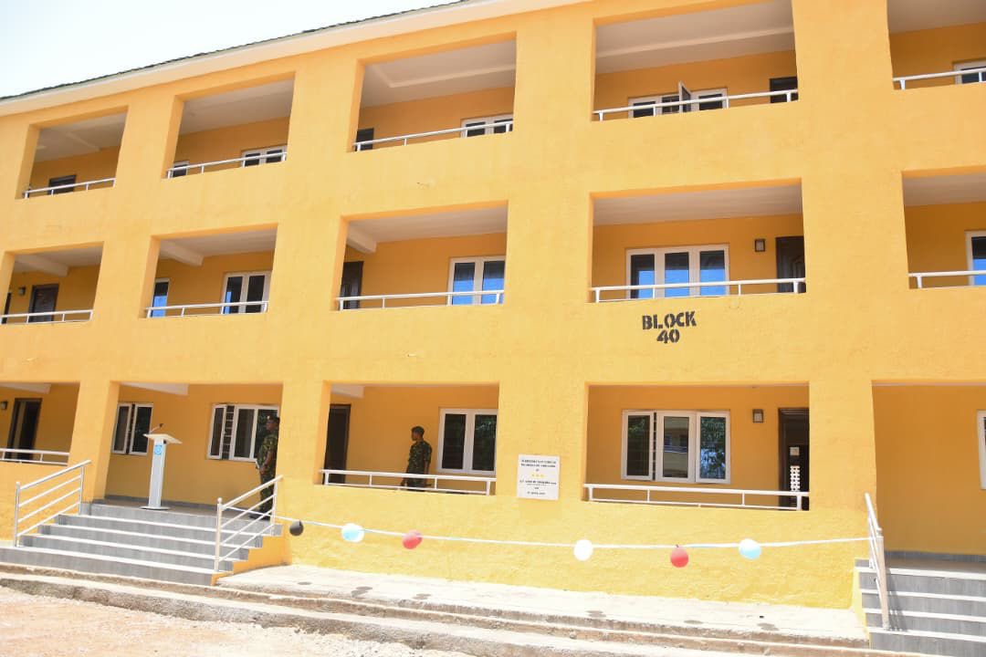 DejiAdesogan's tweet photo. COAS Support Driving Massive Infrastructure Renewal in 1 Division, Says GOC

The Nigerian Army’s 1 Division has embarked on an extensive infrastructure renewal programme that has transformed troop accommodation, worship centres, educational facilities and welfare infrastructure, with the support of the Chief of Army Staff (COAS), Lt.-Gen. Waidi Shaibu, the General Officer Commanding (GOC), 1 Division Nigerian Army and Commander Sector 1, Operation FANSAN YAMMA, Maj.-Gen. Muhammed Wase, has said. 

Wase , who spoke through the Chief of Staff of the Division, Brig.-Gen. Timothy Opurum, during an interaction with defence correspondents in Kaduna, said the intervention was significantly improving the living and working conditions of troops while enhancing operational effectiveness across the Division’s area of responsibility.

According to him, the ongoing transformation is in line with the COAS’ “Soldier First” philosophy, which places premium attention on troop welfare, accommodation and morale as critical enablers of operational success.

He said the Division inherited several infrastructure that needed to be repaired . but had, through prudent management of resources and support from Army Headquarters, embarked on an aggressive programme of rehabilitation, renovation and construction.

“The support from the Chief of Army Staff has been tremendous. His commitment to improving troops’ welfare has enabled us to undertake several projects that are directly impacting the lives of our personnel and their families.

“Many of the structures we met were in very poor condition. Today, most of them have been completely transformed into modern and habitable facilities,” he said.

The GOC explained that one of the landmark achievements of the Division was the renovation of multiple blocks of abandoned accommodation that had previously become uninhabitable.

According to him, following directives and support from Army Headquarters, the Division commenced the rehabilitation of old accommodation blocks in November 2025 and successfully expanded the scope of the project beyond the initial allocation.

He said through prudent financial management and cost-saving measures, the Division was able to renovate six accommodation blocks instead of the four originally approved.

“By carefully managing available resources, we were able to increase the number of renovated accommodation blocks from four to six. This has significantly improved housing availability for officers and soldiers within the cantonment,” he said.

Wase added that the accommodation facilities were further enhanced with the installation of modern solar-powered electricity systems designed to provide uninterrupted power supply.

According to him, more than 65,000 watts of solar power infrastructure have already been installed across the renovated facilities, reducing dependence on the national grid and improving energy sustainability.

He disclosed that another major solar power project currently under construction had reached about 50 per cent completion and was expected to be delivered within the next few months.

The project, he noted, would further improve electricity supply and support military operations within the Division.

The GOC also highlighted extensive roof rehabilitation works carried out on several damaged buildings whose roofs had been blown off by severe weather conditions.

He said the repairs involved complete replacement of roofing sheets, ceiling systems and other structural components to restore the affected buildings to functional standards.

In addition to accommodation projects, the Division undertook a comprehensive renovation of its main auditorium, transforming the facility into a modern conference and event centre capable of hosting military and inter-agency engagements.

“The auditorium was in a deteriorated state before the intervention. Today, it has been remodelled and upgraded to meet contemporary standards,” he said.