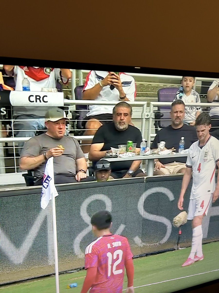 Paulrevuelta's tweet photo. Lads having a full grazing board on the front row 😩 game has never been more gone 🤣 #engvcrc https://t.co/WHf1NQzSgr