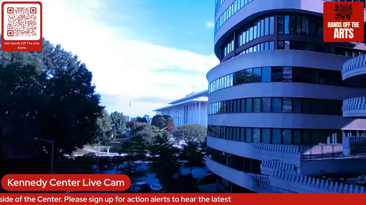 SpencerSays's tweet photo. Hands Off The Arts has set up a camera near the Kennedy Center to monitor when Trump's name comes down. Appears to be at the Watergate. Some excitement over a cherrypicker today, but that equipment is for tree trimming. https://t.co/buwEHM6Dur