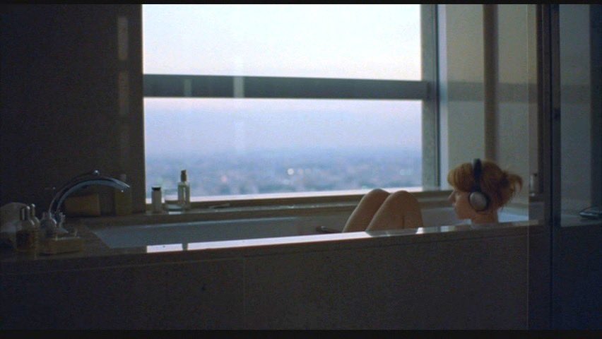 itgirloffduty's tweet photo. lost in translation (2003), sofia coppola. 
i love jet lag and hotel rooms, existing somewhere between places and  coppala just gets that feeling https://t.co/89VehlpUyb
