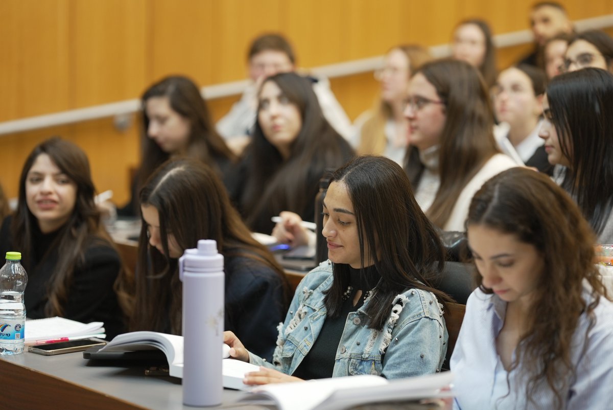 AFUHaifa's tweet photo. Two days after Iranian ballistic missiles targeted Haifa, students are back on campus at the @UofHaifa — sitting final exams after spending part of this week in shelters.

We are proud to stand with this community 💙 https://t.co/wQilZXgofZ