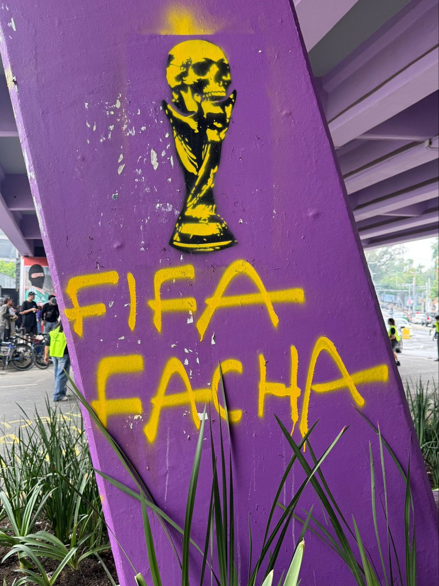 VIM_Media's tweet photo. “Fascist FIFA" seen outside of Azteca Stadium in Mexico City. FIFA has a long history of supporting authoritarian regimes, specifically Benito Mussolini's Italy &amp; Nazi Germany, is currently leaders ike Donald Trump.

We stand united against FIFA!

🖤🔥⚽️✊🏿 https://t.co/QVHKr08CKG