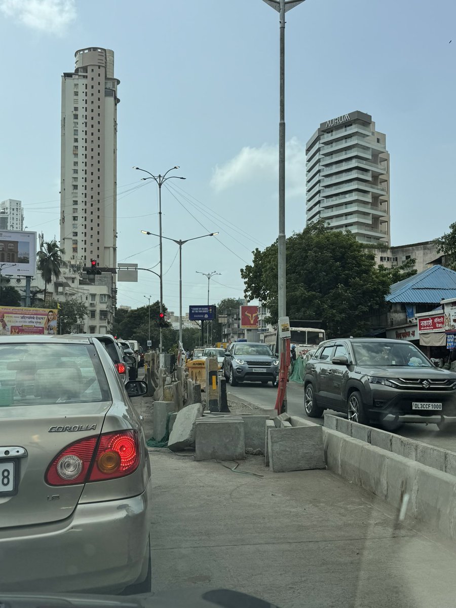 MumbaiFootpaths's tweet photo. Welcome to Worli Naka in Mumbai, where @mybmcWardGS tests your survival skills daily. Solid concrete dividers and debris literally "mushroom" up out of nowhere bang in the middle of active traffic. Who is accountable for this madness @ashwinibhide @MTPHereToHelp @CMOMaharashtra https://t.co/UyTmX0SbhO