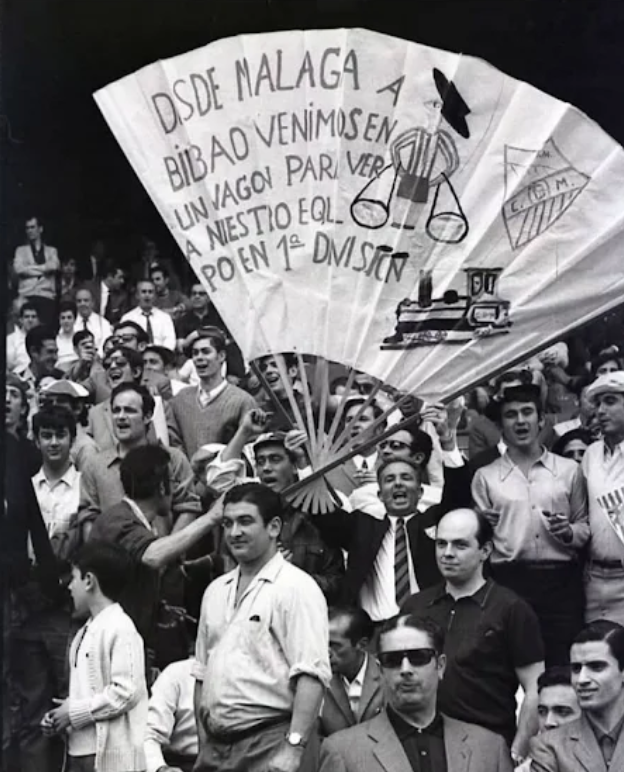 besoccer_ES's tweet photo. "Los aficionados del Málaga son unos subecarros: son así porque hace nada estuvieron en la Champions"

Literalmente la afición del Málaga en 1969 jugándose la permanencia en San Mamés: https://t.co/ZceZq15Gz7