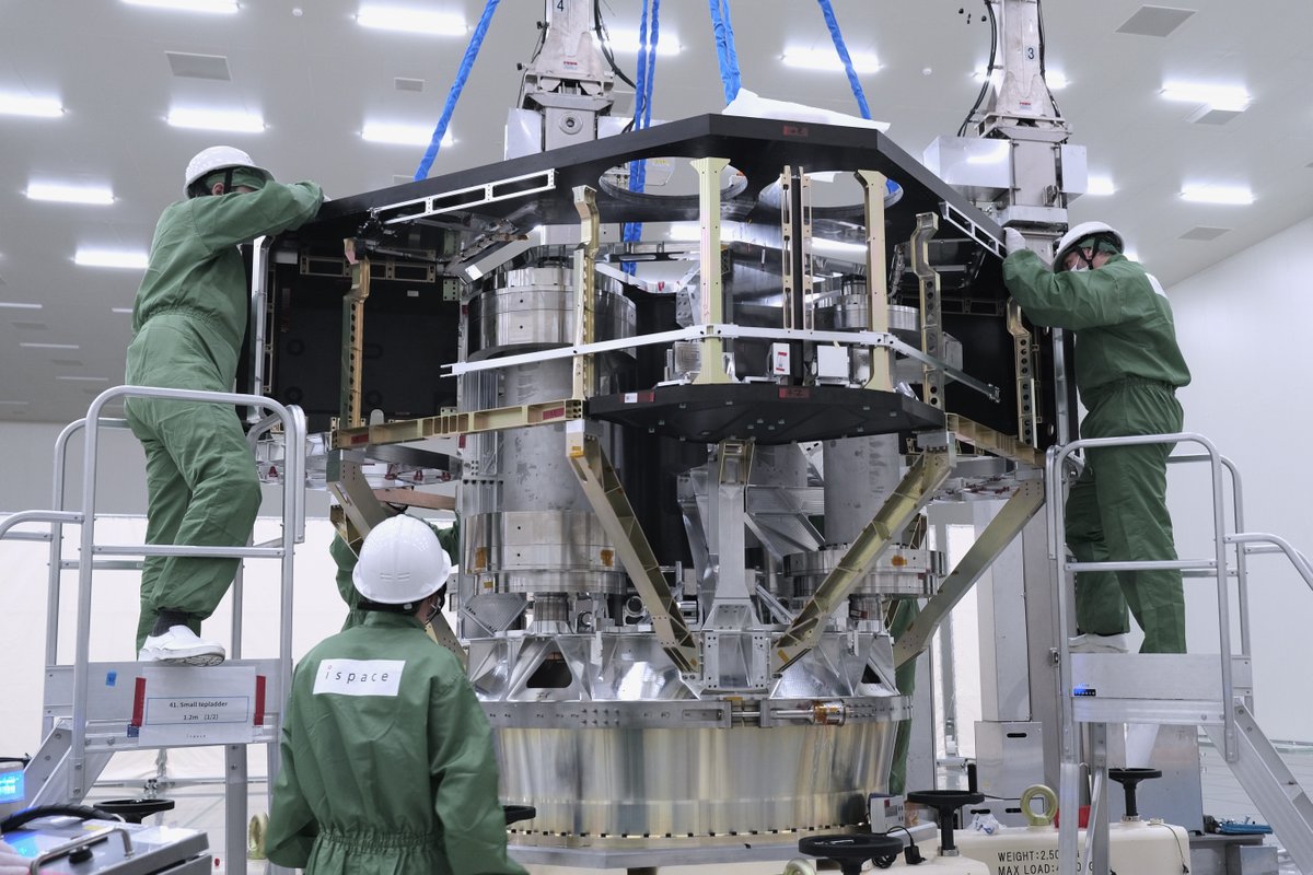 ispace_inc's tweet photo. Piece by piece, the ULTRA Structural Model (SM) has been coming together. 🌘—>🌗—>🌕

These photos capture the final moments of a key integration activity for the ULTRA lunar lander's SM ahead of the testing campaign. Guided by precise crane operations and careful manual adjustments, our engineering team aligned the upper assembly with the lander's primary structure before successfully bringing the two together.

This operation marks the completion of a key phase of SM assembly, preparing the hardware for its next chapter—testing.

#ispace #ULTRA #LunarExploration #AIT #Engineering #Teamwork