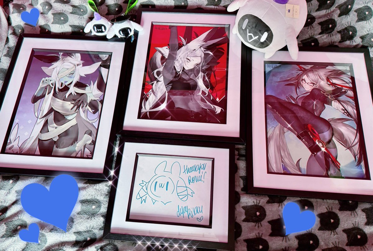 RemiFiend's tweet photo. I got my signed prints all framed and ready to put up on the wall! 
I'm so incredibly thankful for this amazing gift, thank u so much @TacticalRevCard for getting these for me.🥹
and of course thank u @dyarikku for the beautiful artwork, time and the lil doodle, I'll cherish them forever! 💕