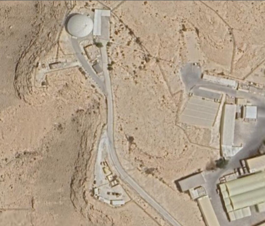 BabakTaghvaee1's tweet photo. BREAKING: A U.S. early warning radar site on Jabal ad Dukhan in Bahrain was targeted during today's ballistic missile attacks of the IRGC Aerospace Force and is currently burning.

The images show the radar installation located on Bahrain's highest point, Jabal ad Dukhan, which hosts military communications and surveillance infrastructure. Additional imagery provides a satellite view of the site and its location.

The extent of the damage and the operational status of the facility remain unknown. No official statement has yet been released by U.S. military authorities or the Bahraini government regarding the attack.

#OperationEpicFury
#OperationLionsRoar