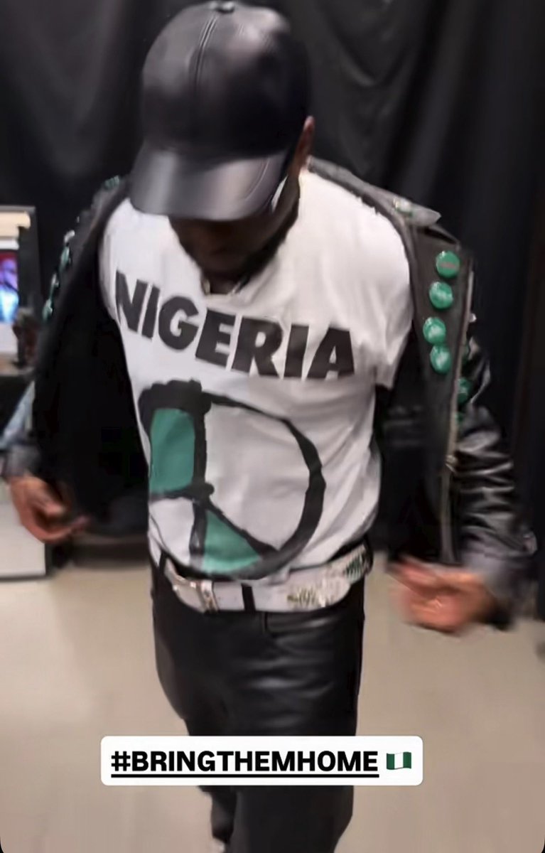 DurkioWiz's tweet photo. Davido’s stylist recreated the shirt Michael Jackson wore in “They don’t care about us” video to protest social injustice, discrimination &amp; police brutality but with the Nigeria flag print  🇳🇬🔥 https://t.co/ZE46l1wHKN