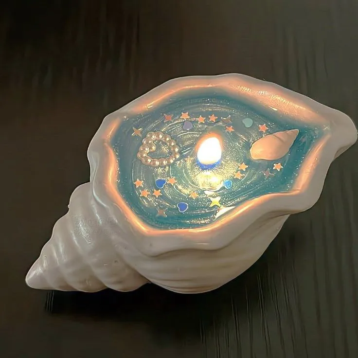 artindetails's tweet photo. seashell candles https://t.co/zCzPgn5oHO