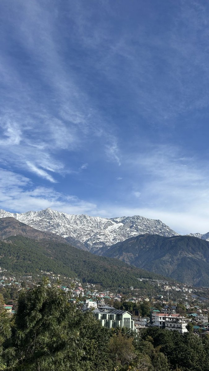 prishhss's tweet photo. Captured this in Dharamshala a year ago. Even after visiting the place multiple times, the sight of those snow covered mountains never gets old. There’s something about watching the Dhauladhar range towering over the town that makes every visit feel special. https://t.co/0bFNmmuCKG