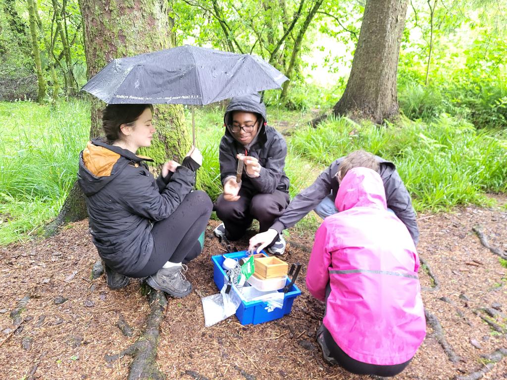 MissShawGeo's tweet photo. A great (but rainy) day out with AH Geographers in Balmaha practicing physical fieldwork. Pupils used quadrats to count vegetation, clinometers to measure the angle of slopes and digital pH and temperature/moisture readers when collecting soil samples @StAndrewsRCSec 🌿☔ 🌎 https://t.co/UxjdpwAI84