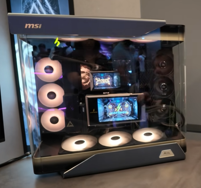 theRab's tweet photo. @msigaming enjoyed every minute at Computex in the MSI booth with Moses and your team - that MEG Maestro 900R "Red Dot" design is a beautiful elegant beast of a PC build! https://t.co/dc7l9BAu15 https://t.co/79l4J1FIUH